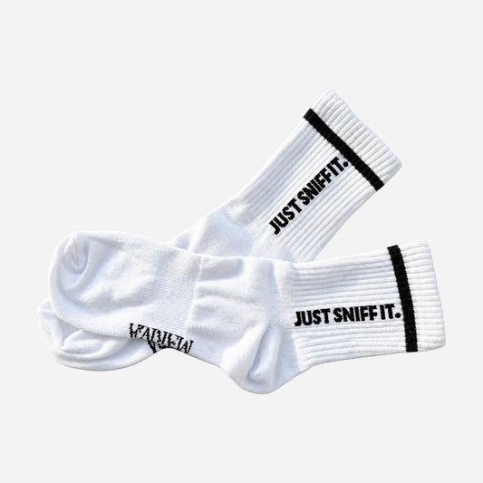 Just Sniff It Socks on a light grey background